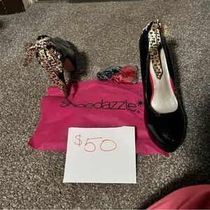Black heels with leopard, hot pink and black ribbon. Size 8